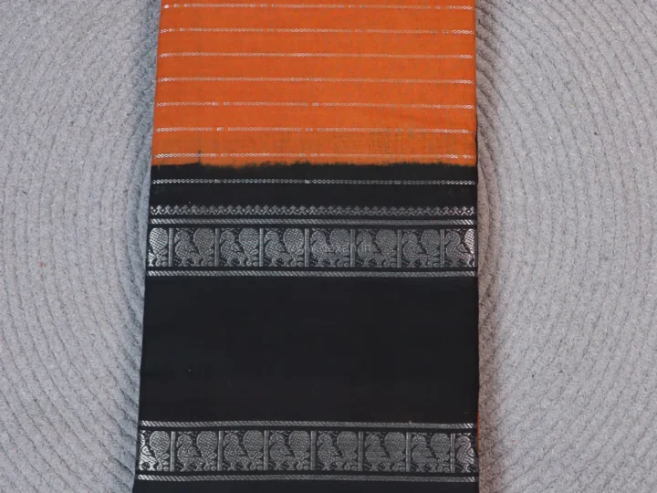 Copper Orange Body with Raisin Black Border and Silver Velthari Stripes